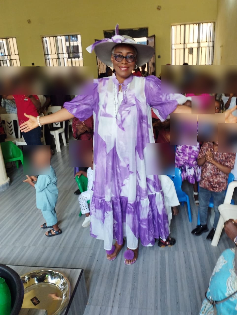 A guest celebrating with children at an HCCO event