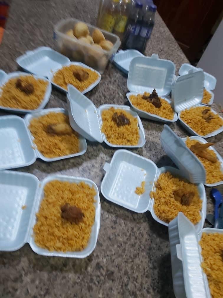 Boxed jollof rice meals ready for distribution